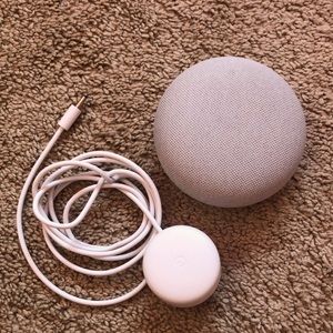 Google Nest mini , Gen .2 in white.